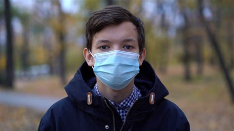 Boy In Medical Mask On The Street Stock Video Footage 0010 Sbv