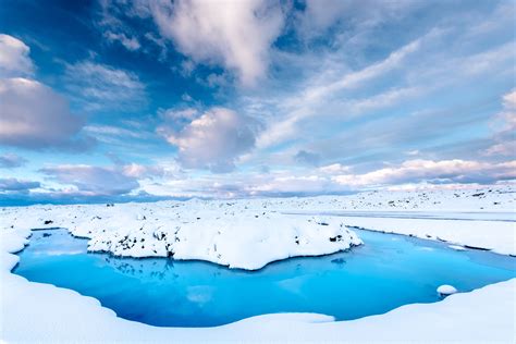 2560x1440 Snow In Water Iceland Clouds Clear Sky 4k 1440p Resolution