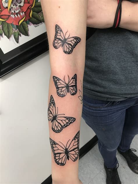 Butterflies Tattoo On Arm And Hand Butterfly Tattoo Meanings Not Just