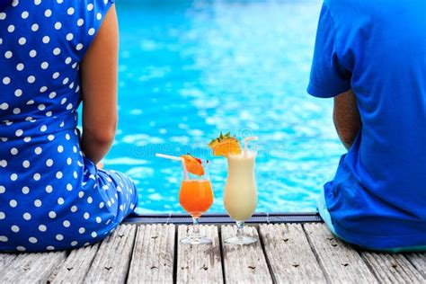 romantic couple drinking cocktails near pool or stock image image of outdoor romantic 61904963
