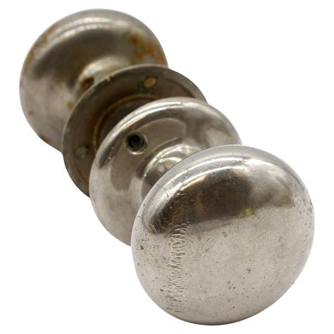 Pair Of Round Brass And Nickel Plated Door Knobs With Matching Rosettes