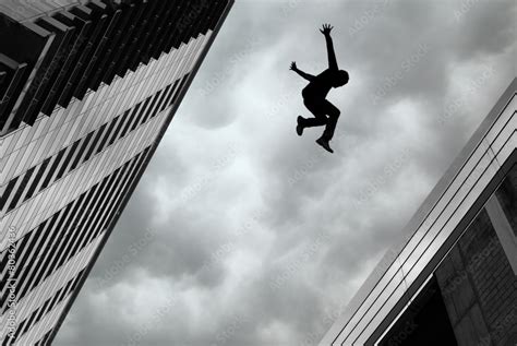 Man Jumping Off Building Stock Foto Adobe Stock