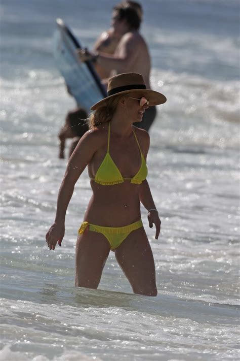 Britney Spears Hits The Beach In A Yellow Bikini In Hawaii