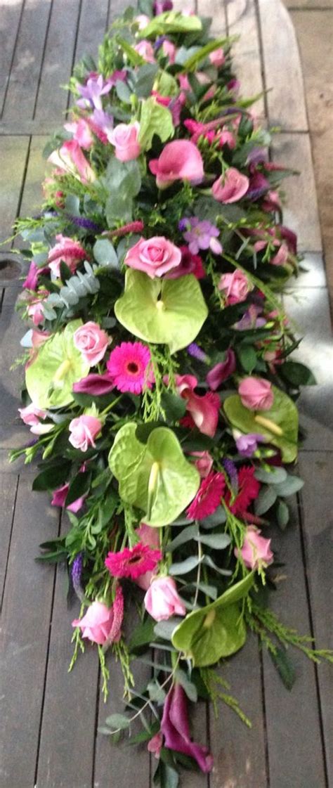 We did not find results for: Full length funeral tribute with calla lilies, roses ...