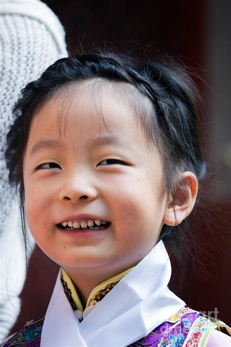 Chinese Little Girl In Traditional Dress Smiling Photograph By Matteo