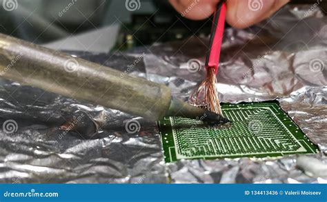 Soldering Chip On The Soldering Station With Alignment Stock Photo