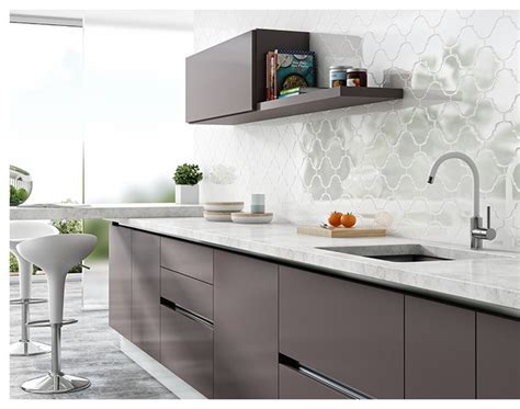 The tiles make the surface easy to clean and choosing the right kind of backsplash adds to the personality of your. Modern Kitchen Backsplash Arabesque Wall Tiles