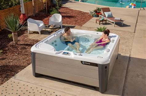 Are you wondering how much water washing machines actually use? How much does a hot tub cost? - HotSpring Hot Tubs