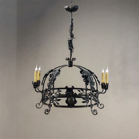 Explore candelabras and sconces for new ideas replacing electric light bulbs. Antique Italian Wrought Iron Chandelier