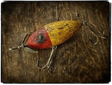 Some antique fishing lures are collectible, some catch fish just as well as they did when they had fresh paint, and others are just trash with rusty when it comes to antique fishing lures and other tackle, i'm more of an accumulator than a collector. Dan Routh Photography: Fishing Lures