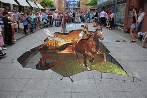 德国艺术家街头创作超逼真3d绘画央广网