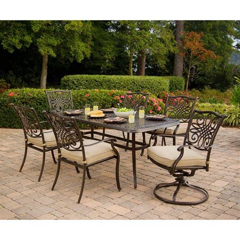 A mosaic or tiled outdoor dining table provides a creative flair. Hanover Traditions 7-Piece Patio Outdoor Dining Set with 4 ...