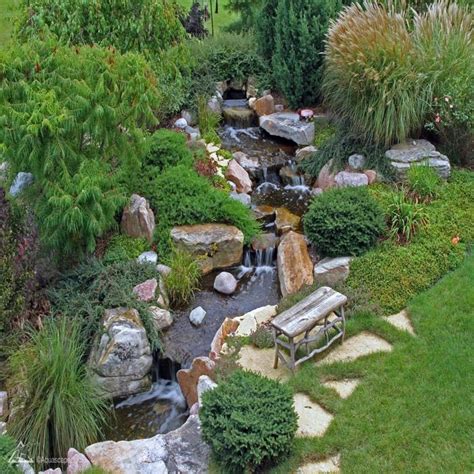 Enjoy the sight and sound of running water in your backyard by installing a backyard waterfall using aquascape's diy backyard. Aquascape Large Pondless Waterfall Kit 26' Stream w/ Pond ...