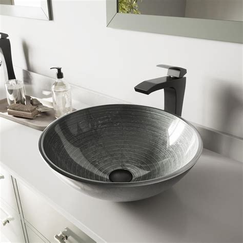 Especially now the walls are black a gold faucet! VIGO Glass Vessel Sink in Simply Silver and Blackstonian ...