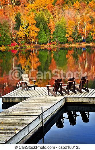 Wooden Dock On Autumn Lake Wooden Dock With Chairs On Calm Fall Lake
