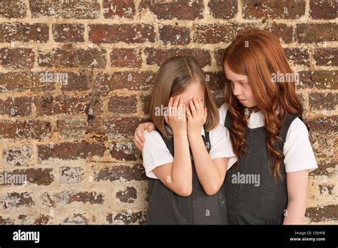 Girl Comforting Her Friend Stock Photo Alamy