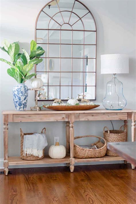 The furniture is often found in entrance halls, the foundation for a stylish vignette to greet visitors. 23 Amazing Ways To Style Your Console Table With Fall Decor