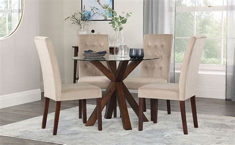 Novara chrome metal 100cm round glass dining table and 4 corona silver dining chairs. Hatton Round Dark Wood and Glass Dining Table with 4 Regent Mink Velvet Chairs | Furniture Choice
