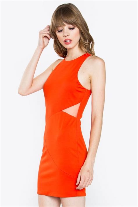 TRAJE NARANJA Meraki Boutique