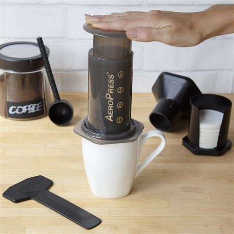 aeropress coffee and espresso maker with tote bag and 350 additional filters quickly makes