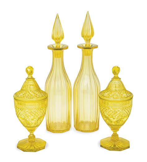 A Pair Of Yellow Cut Glass Decanters And Stoppers And A Pair Of Jars And Covers 19th Century