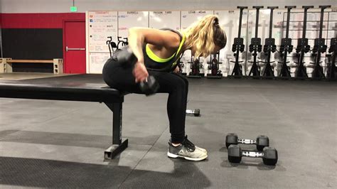 Do these exercises if you like to workout with dumbbells to put primary emphasis on your rear delts, raise the dumbbells straight out from your body. P360: Seated DB Rear Delt Raise - YouTube