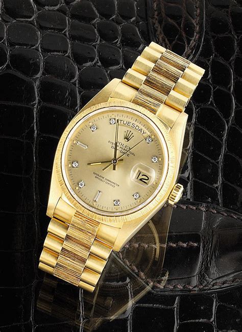 An 18ct Gold Oyster Perpetual Day Date Wristwatch By Rolex Christies