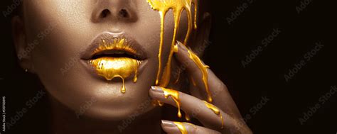 Gold Paint Smudges Drips From The Face Lips And Nails Lipgloss Dripping From Sexy Lips Golden