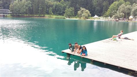 Swimming In Emerald Green Waters Of Lake Bled Slovenia