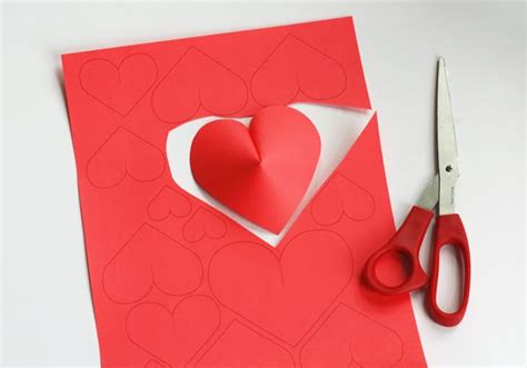 Cutdiy how to make paper heart | paper cutting design heart shape for decoration. Valentine's Day DIY Idea: Make a Wall of Paper Hearts ...
