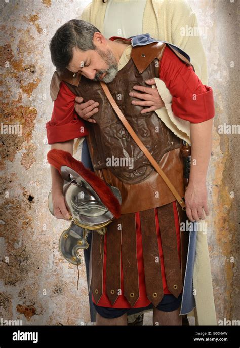 Jesus Hands Holding Exhausted Roman Soldier Stock Photo Alamy
