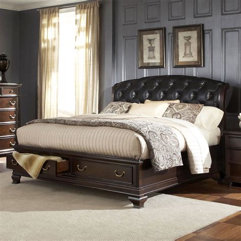 The Lavishly Designed Button Tufted Black Bonded Leather Headboard On A Sleigh Frame Will