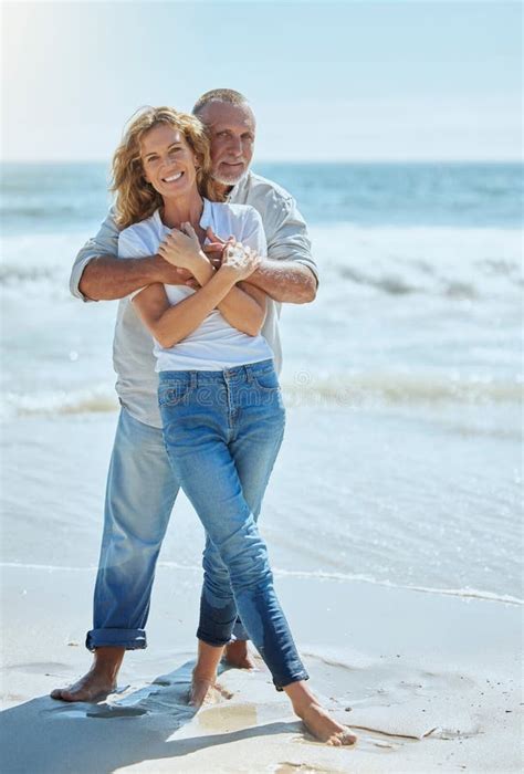 Portrait Of A Happy And Loving Mature Couple Enjoying A Day At The