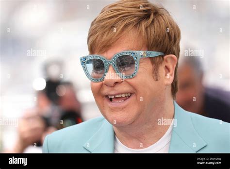 Singer Elton John Poses For Photographers At The Photo Call For The Film Rocketman At The 72nd