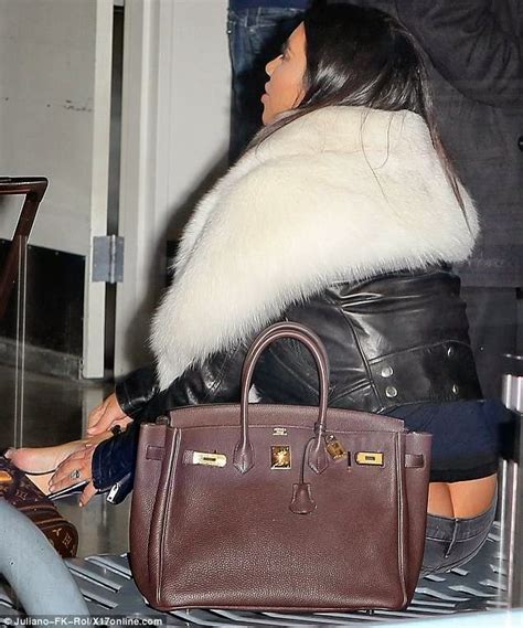 Photos Kim Kardashian Suffers Wardrobe Malfunction At Lax Airport In