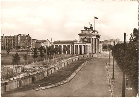 Brandenburg Gate With The Berlin Wall And The Adlon Hotel At The Far