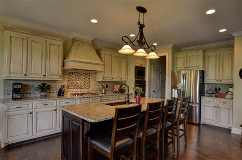 A mudroom greets you by the garage, and a separate utility room includes a sink and counter space. Donald Gardner Home Design - Butler Ridge - Glenn Harbor - Traditional - charlotte - by C & M ...