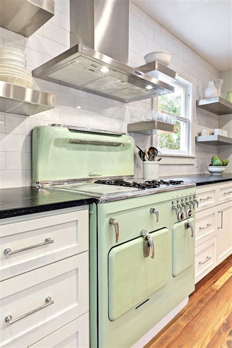 Incredible Kitchen With Mint Green Enamel Stove Flanked By White Shaker