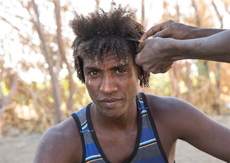 Afar Man Having A Traditional Hairstyle With A Stick To Ma Flickr