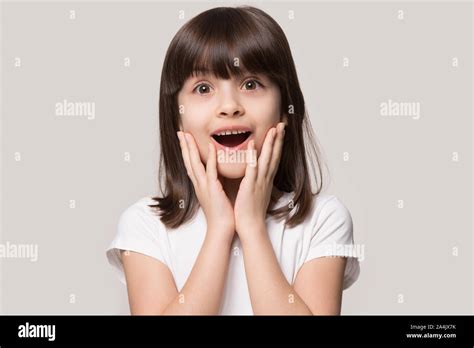 Amazed Little Girl Surprised By Good Unexpected News Stock Photo Alamy