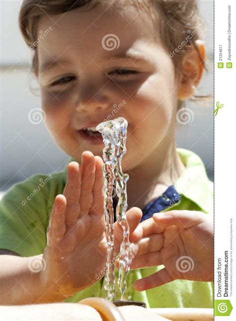 Kid Playing With Water Stock Image Image Of Drinking