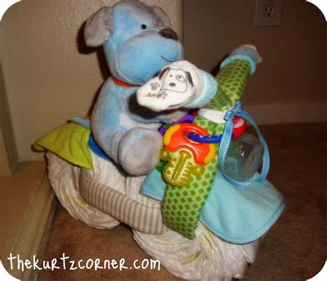 Just a quick video by thom on how to make a cool diaper cake for a baby shower or even a birthday gift. The Kurtz Corner: Motorcycle Diaper Cake...Vroom!