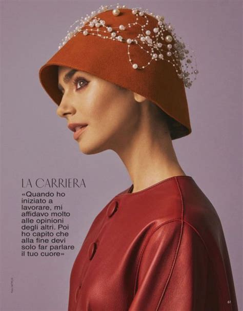A Woman Wearing A Red Hat With Pearls On The Brim Is Featured In A Magazine