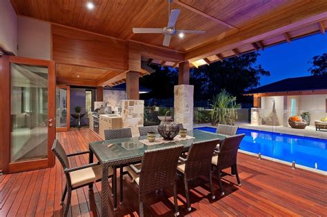 Outdoor kitchens are some of the most useful renovations and according to karp, a smart investment. 2013 Luxury Modern Outdoor Kitchen in the Swimming Pool. Love the plexiglass | Outdoor kitchen ...