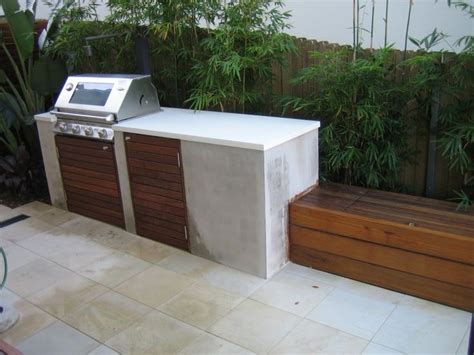 These bbq ideas range from simple areas to built in bbq and combined seating areas with roofs and canopies as well as all the kinds of things you lighting as well as sinks and drainage are often seen in these ideas. Built in bbq with bench seating. | Outdoor kitchen ...