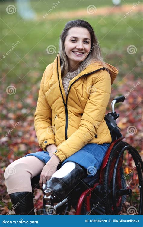 Beautiful Disabled Woman Sitting In A Special Chair Stock Photo