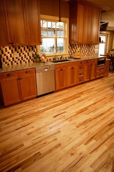 White painted shaker cabinetry & driftwood on hickory cabinetry. Natural hickory floor contrasts well with cabinets -- not ...