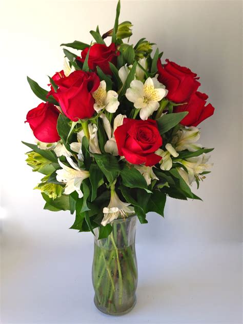 Use our flower arranging ideas and tips to get expert ideas that will help you tailor your next floral arrangement to your style. Valentine Flower Arrangement. Holiday Roses. Red, white ...