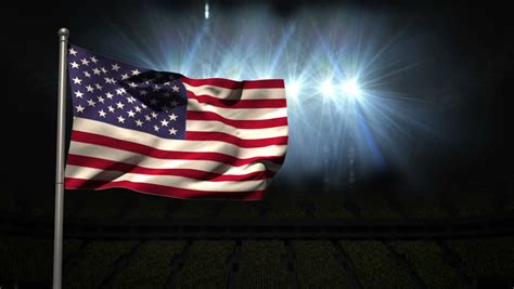 Large Usa National Flag Waving On Black Background With Flashing Lights