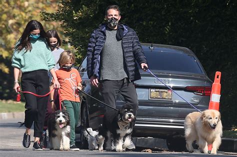 Days, weeks, and months all congealed into the same amorphous blob, a kind of perpetual tuesday. Ben Affleck, Ana de Armas and his kids walk the dogs